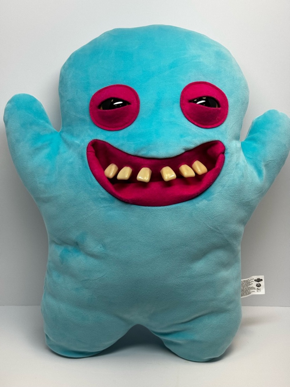 This is a big blue fuggler 18”  inch monster doll in excellent used condition.